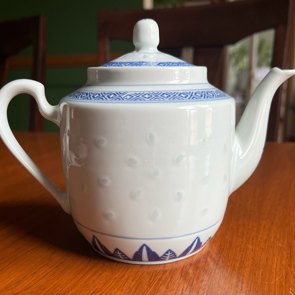 Charming White Teapot with Blue Accents